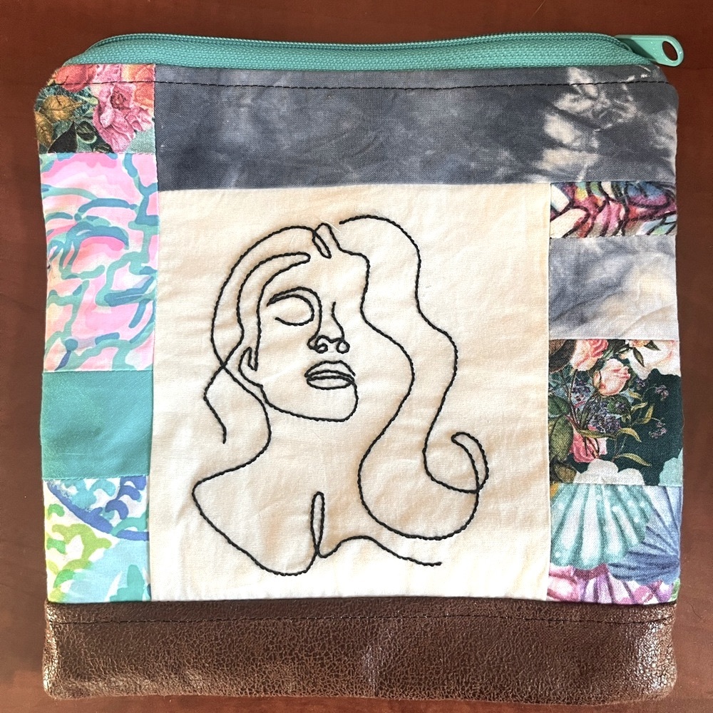 Hand embroidered patchwork 9” zipper pouch